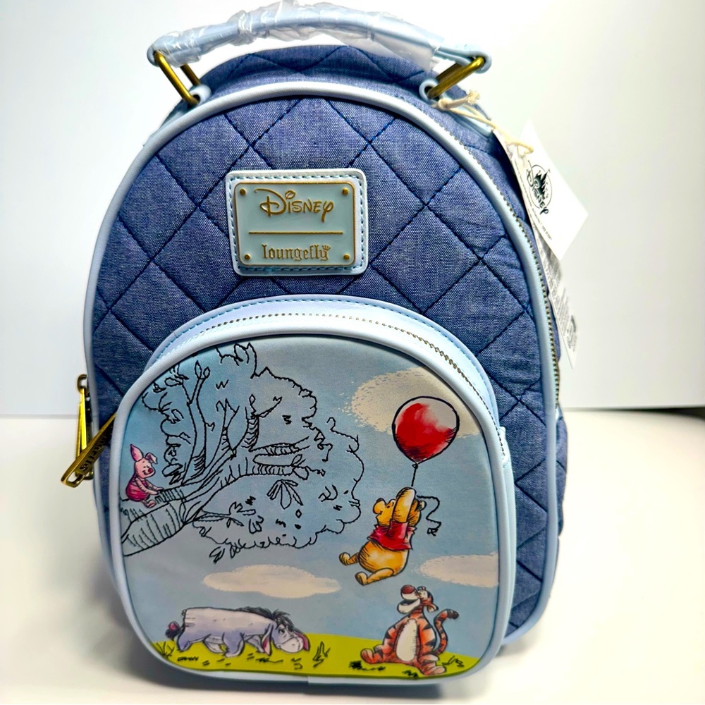 NWT. Disney Loungefly Winnie the Pooh Mini Backpack. Winnie the Pooh & his pals